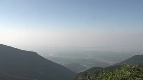 Mountaintop overlooking the mountain Stock Footage 235136354