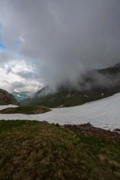 Mountaintop Views Through The Clouds Stock Photos
