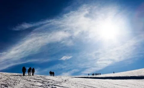 Mountaneers walking on a glacier Stock Photos