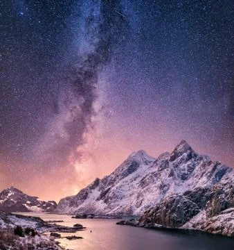 Mountans and reflection on the water surface at the night time. Stock Photos
