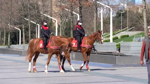 Mounted Cops control corona measures in Taksim and İstiklal Street. Stock Footage 148472667