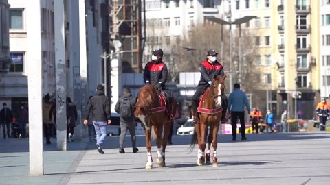 Mounted Cops control corona measures in Taksim and İstiklal Street. Stock Footage 148472914