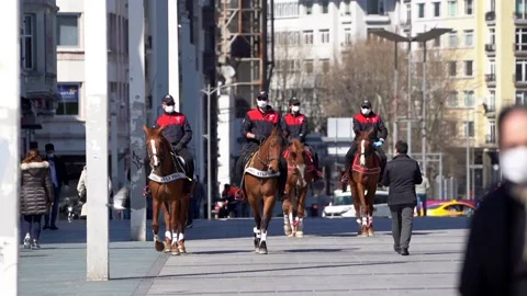 Mounted Cops control corona measures in Taksim and İstiklal Street. Stock Footage 148473182