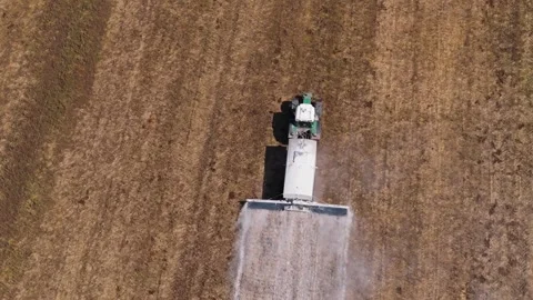 Mounted Tractor Working On Field Adding Lime Vídeos de archivo 277102703