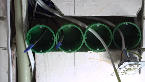 Mounting boxes for switches. Electrical wiring in the apartment  Stockbeeldmateriaal 246434078