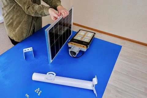 Mounting bracket for attaching solar panel and led street light to pole or .. Stock Photos