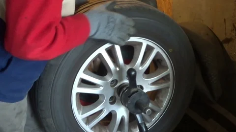 Mounting. Car wheel balancing Stock Footage 94772429