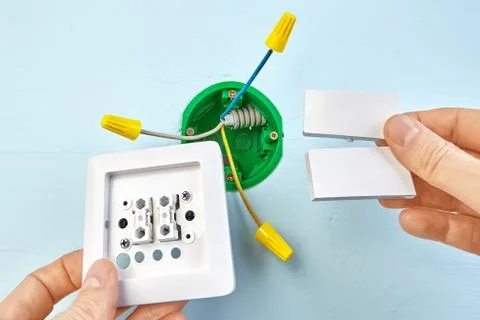 Mounting of double light switch. Stock Photos