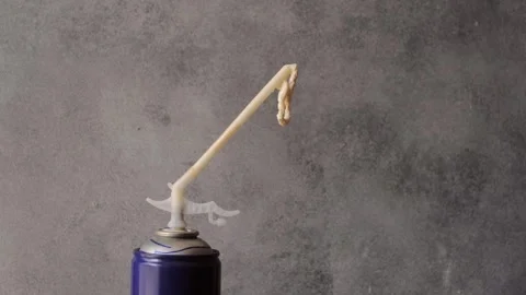 Mounting foam flows out of the can. Stock Footage 249270981