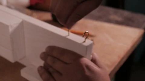 Mounting the hook into a handmade product 库存影片 110684831