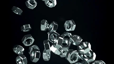 The mounting nuts fly up and fall down. Filmed on a high-speed camera at 1000 Stock Footage 307931271