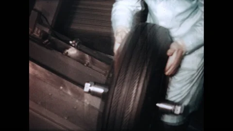 Mounting the Tire 1967 Stock Footage 167289972