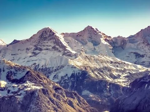 Mounts Eiger, Moench and Jungfrau in the Jungfrau region Stock Photos