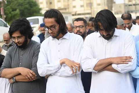 Mourners attend funeral prayers for missing crew members of crashed Pakistani ca Stock Photos