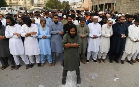 Mourners attend funeral prayers for missing crew members of crashed Pakistani ca Stock Photos