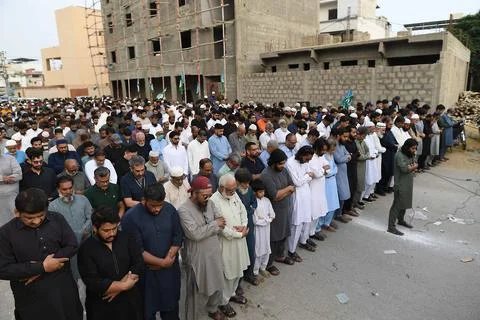 Mourners attend funeral prayers for missing crew members of crashed Pakistani ca Stock Photos