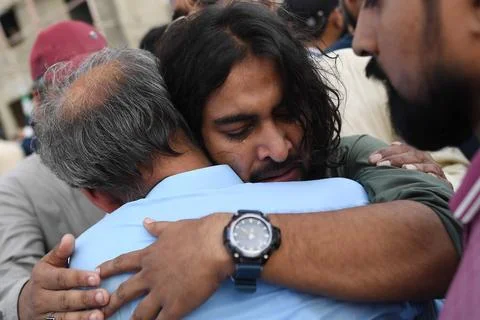 Mourners attend funeral prayers for missing crew members of crashed Pakistani ca Stock Photos