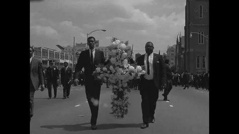 Mourners in a procession during the funeral of Dr. Martin Luther King Jr. - 1968 Stock-Footage 107555880