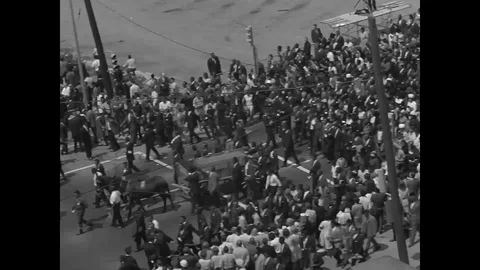 Mourners in a procession during the funeral of Dr. Martin Luther King Jr. - 1968 Stock-Footage 107555896