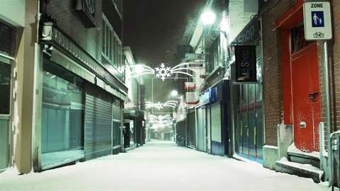 Mouscron, city centre :  empty street after snowfall Stock Footage 90277460