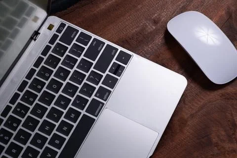 Mouse and laptop Stock Photos