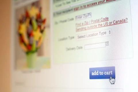 Mouse clicking add to cart button on website Stock-Fotos