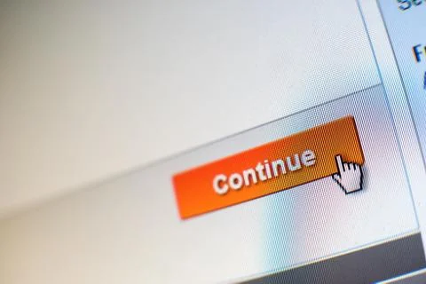 Mouse clicking "continue" button in an e-commerce website Stock Photos