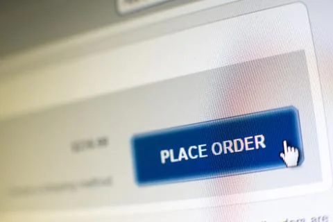 Mouse clicking "place order" button in an e-commerce website Foto stock