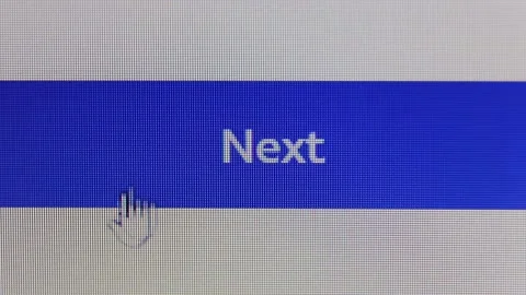The mouse cursor is hovered over the NEXT button and the button. Stock Footage 237618015