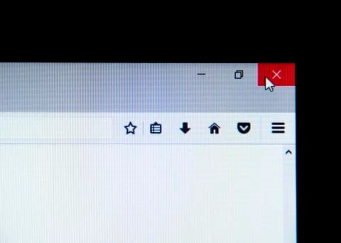 Mouse cursor on red X in upper right hand corner Stock Photos