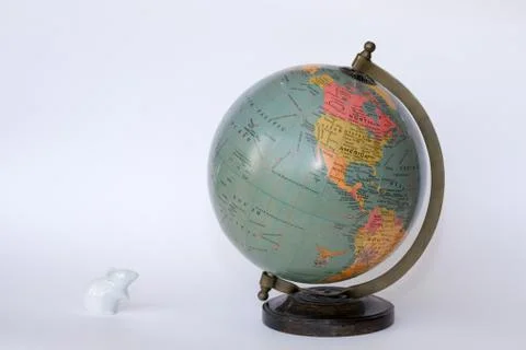 Mouse by a globe Stock Photos