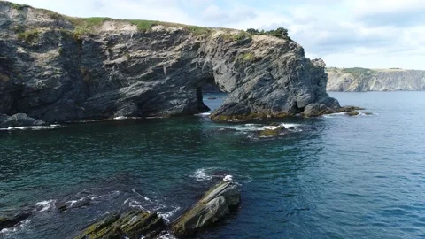 Mouse Hole sea arch approach Stock Footage 185992000