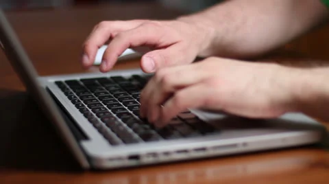Mouse keyboard and trackpad Apple MacBook laptop Video stock 39383094