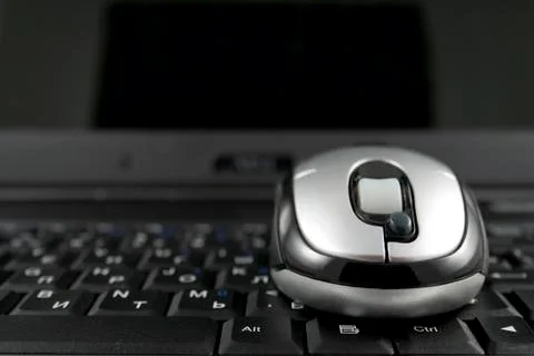 Mouse on a laptop keyboard Stock Photos