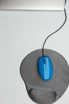 Mouse, pad and notebook computer on white Stock Photos