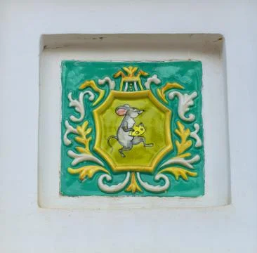 A mouse with a piece of cheese. Myshkin Stock Photos