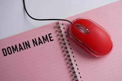 Mouse with printed note DOMAIN NAME. World Internet Day concept 库存照片