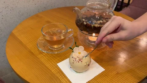 Mousse beige dessert cut with a spoon, creamy dessert close-up. Almond dacquoise Stock Footage 308692663