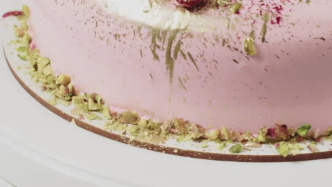 Mousse cake with fruit for a birthday. Decorating the cake with fresh fruit. Stock Footage 156667809
