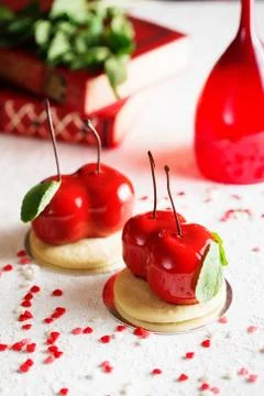 Mousse dessert in the shape of a cherries. Stock Photos