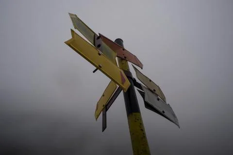 Moutain Road Mist Direction Pointers Stock Photos