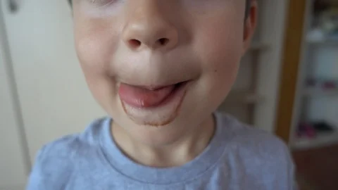 Mouth and face of child dirty after eati... | Stock Video