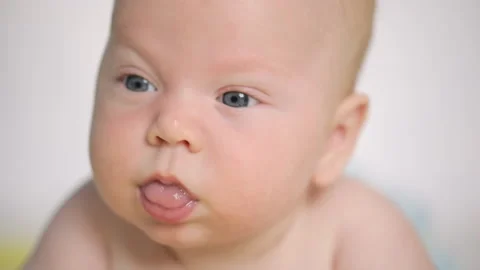 Mouth with saliva of a newborn baby, Stock Video Pond5