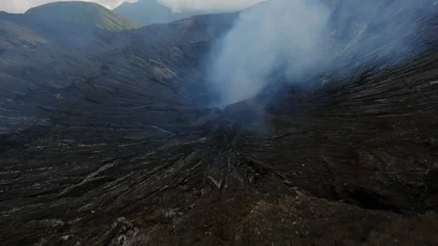 The mouth of a smoking volcano inside Stock Footage 247500580