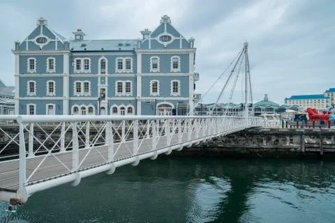 Movable bridge at waterfront harbor Stock Photos