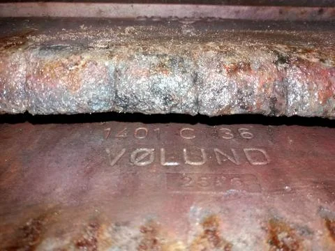Movable Burner Grates for Efficient Cooking in a Rustic Kitchen Setting Stock Photos