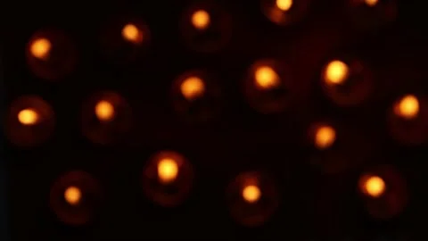 Movable pattern of lights from tea candles, top view Stock Footage 195522785