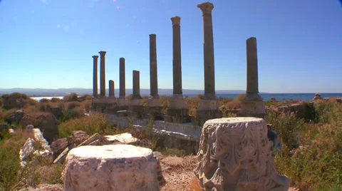 A move across the pillars of the ruins of Tyre in Lebanon. Video stock 34428792