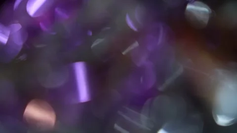 Move and blur the colored bokeh to the left Stock Footage 315319777