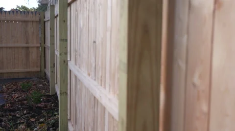 Move Backward and Forward Along Side of New Fence Stock Footage 68777979